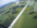 View over fields from a plane, cessna